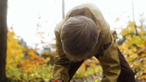 kid taking toys to play outdoors