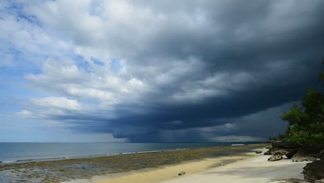 dramatic seascape timelapse of monsoon clouds and rains over the sea in tanzania's dar es sallam beach