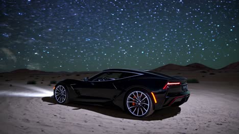 stunning black sports car under a starry night sky in the desert