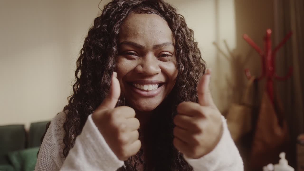 Happy Woman Giving Two Thumbs Up