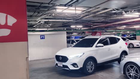 underground parking garage with white suv