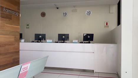 Pharmacy-Farmacia-empty-waiting-room-and-counter-during-pandemic-COVID-times-in-Clinic-Hospital-in-Latin-America