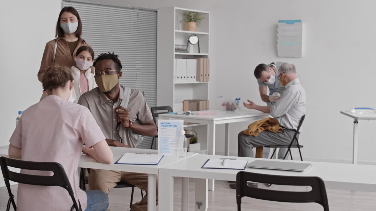 People Signing for Covid-19 Vaccination