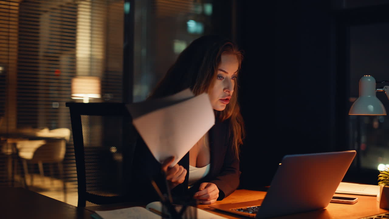 Frustrated office employee debating online at night work. Manager ending call
