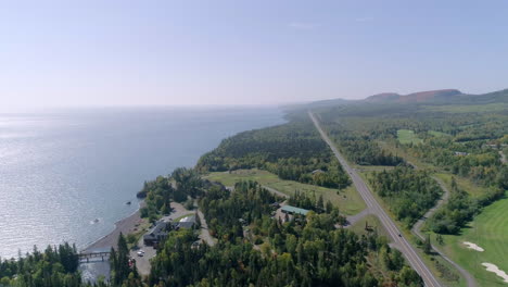 ariel of car driving along the north shore of lake superior