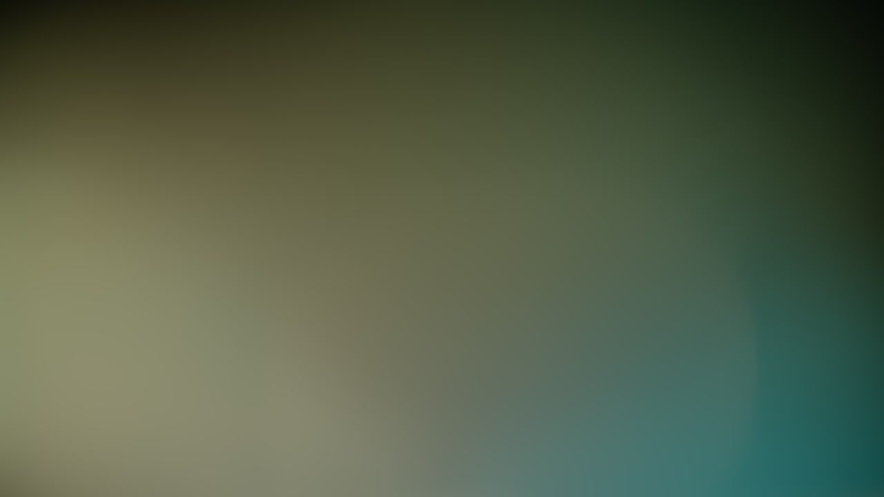 Multicolored light leaks 4k footage on black background. Stylizing video, transitions. Bokeh effect