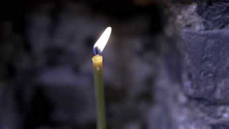 candle in a wall niche