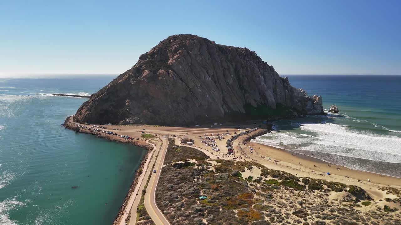 A long straight shot approaching Morro Rock from across the bay’s flat water