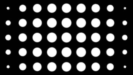 dynamic black and white composition with blurred dots scaling. retro and vintage pattern animation