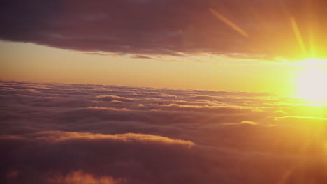 beautiful sunrise above the clouds