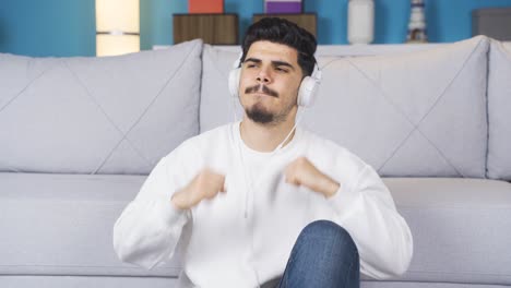 Young-man-listening-to-rock-music.