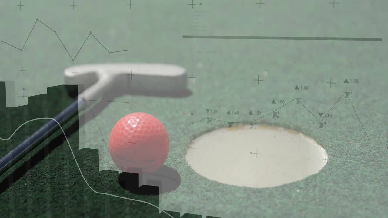 Pink golf ball resting on green turf near white rim golf hole, showing data graph overlays