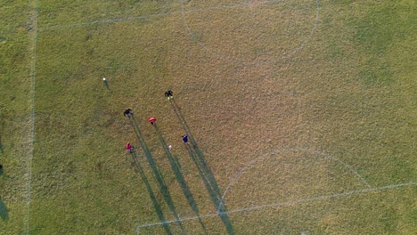 soccer players playing monkey in the middle-keepaway