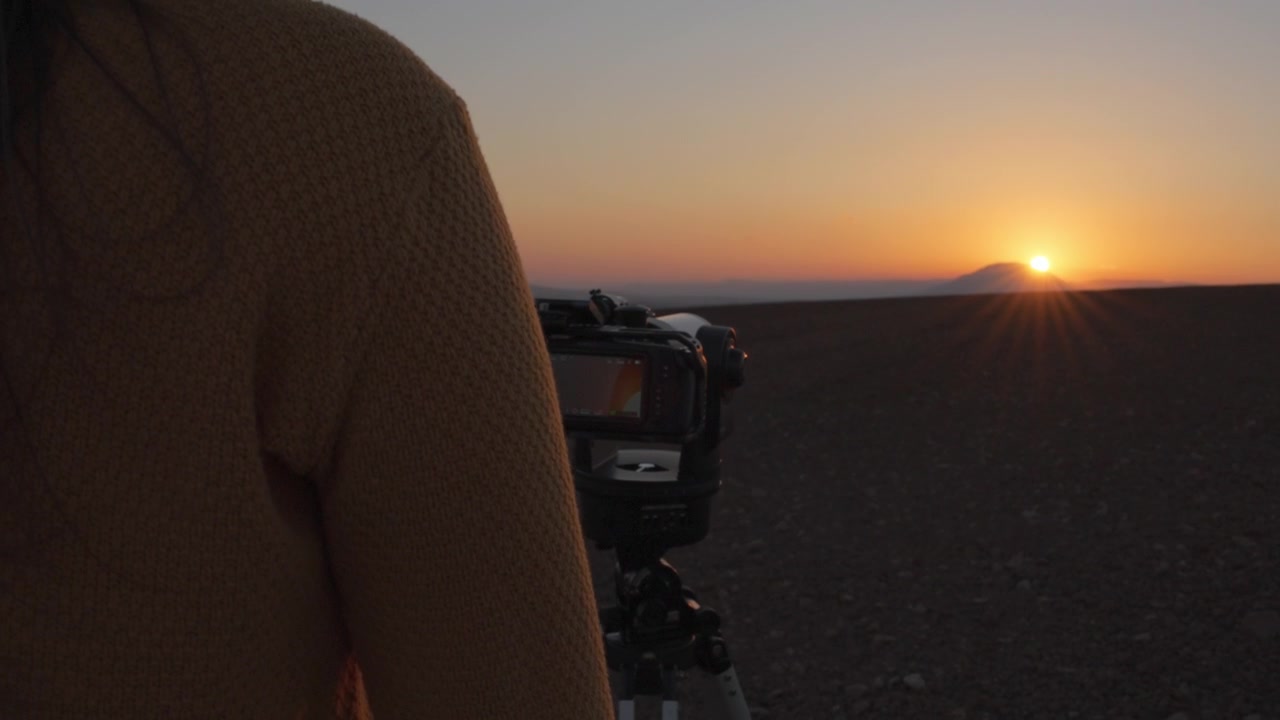 Filming a sunset with a telephoto lens