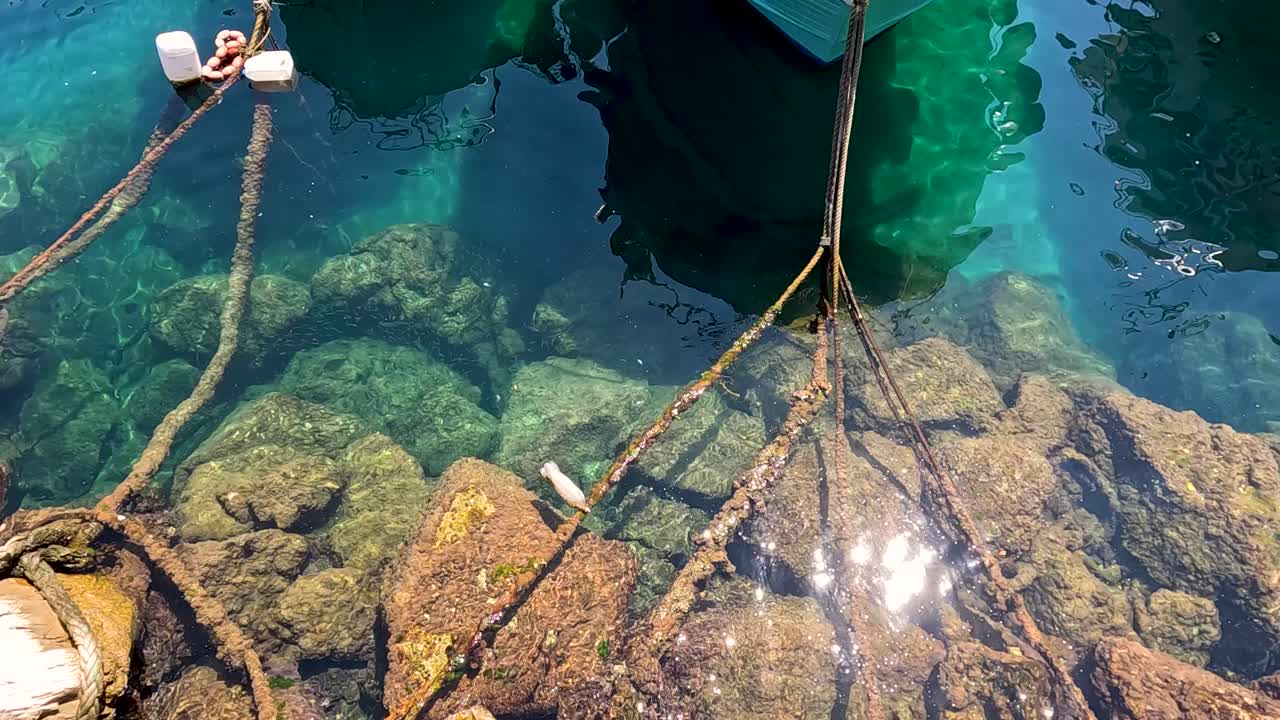 Boat tied to dock in Sorrento, Naples