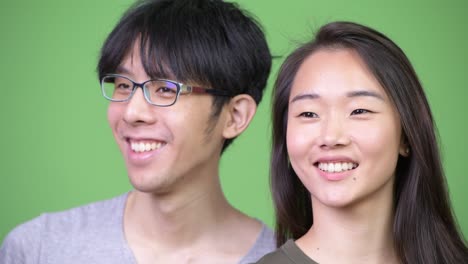 young asian couple thinking