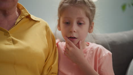 cute little girl in a soft pink