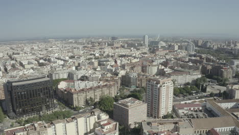 drone shot of famous city in spain, valencia city hall in historic centre of city - landscape panorama of europe from above on a sunny day without clouds log
