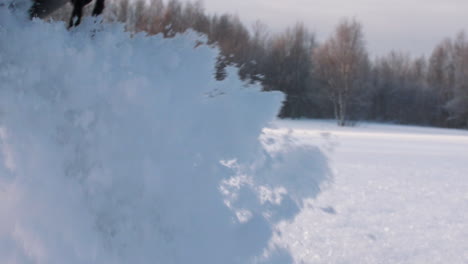 feet walking in deep snow shot in slow motion