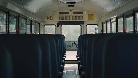 interior school bus staying empty on parking close up. vehicle comfortable seats