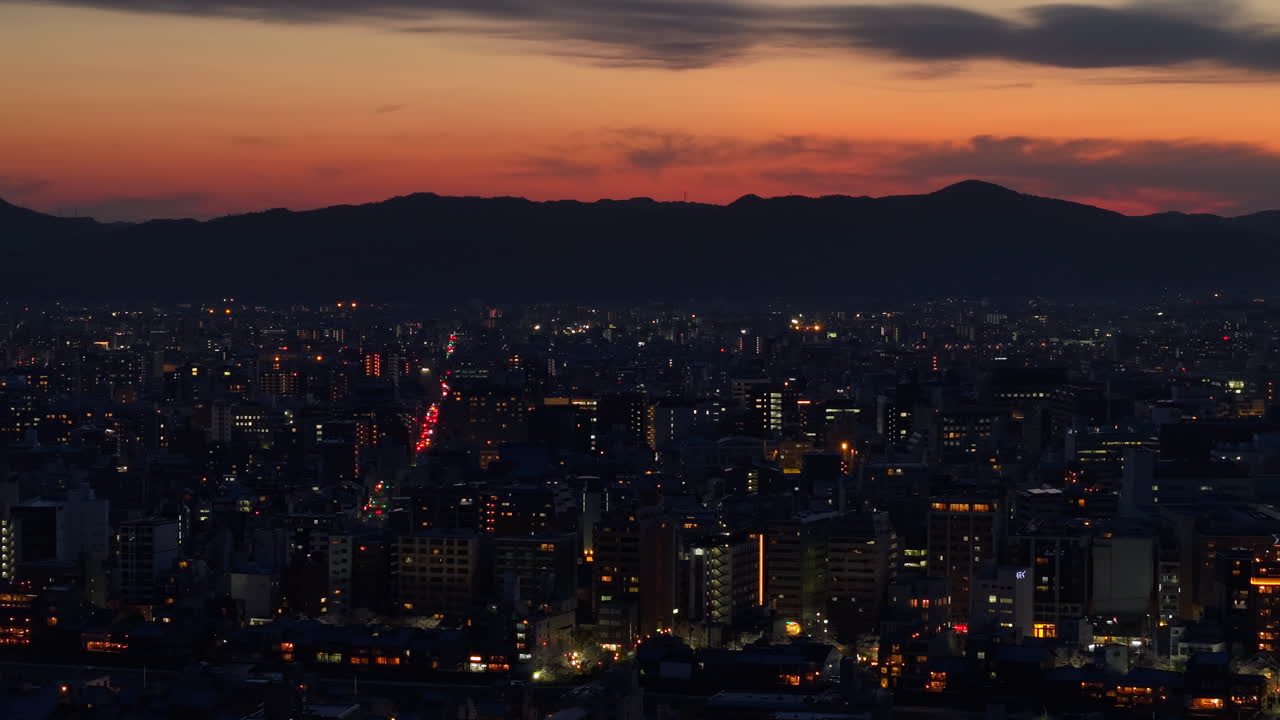 Aerial drone view of Kyoto, Japan at sunset