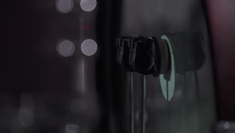 a macro shot of a double bass drums kick filmed in a dark basement during rehearsal