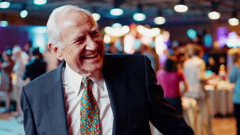 elderly man at a party