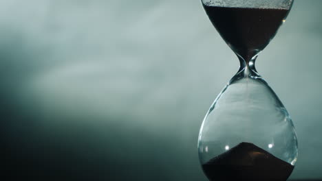 bright beam of the spotlight illuminates the hourglass 2