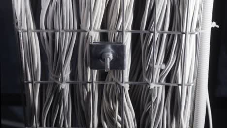 organized cables in a wire basket