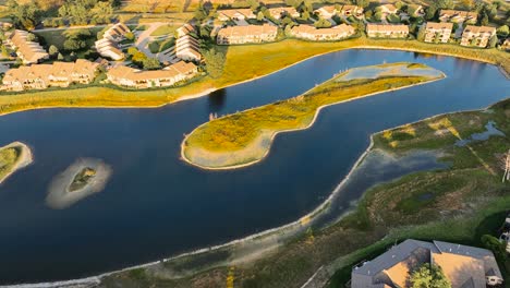 a man made pond in the middle of a condominium in muskegon