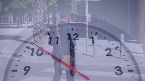 Animation-of-clock-moving-over-african-american-businessman-walking