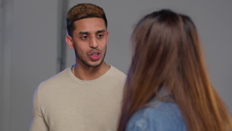 close up of male and female actors shooting movie or video scene in studio on set 2