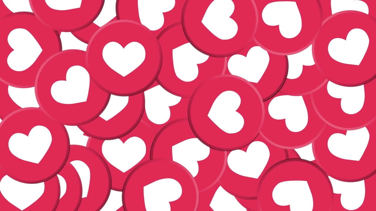 Animazione di più icone a forma di cuore che cadono su sfondo nero
