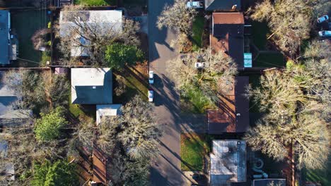 4k aerial birds eye drone shot overlooking suburban houses