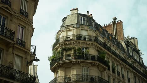 parisian corner building with balconies