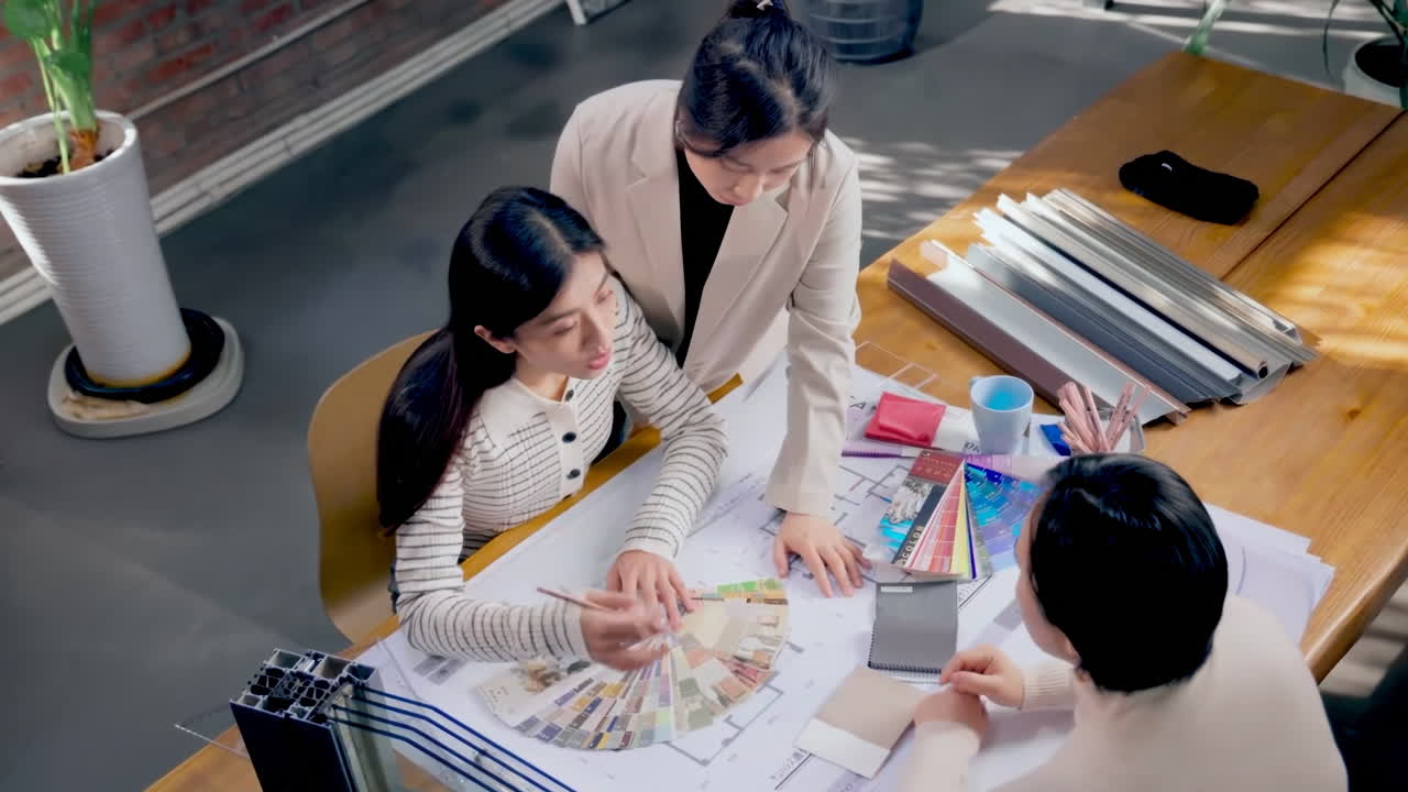 Top view Discussion architecture teamwork reviewing blueprints project, floor plan engineering construction office. Business diversity professional worker group collaboration meeting for drawing idea