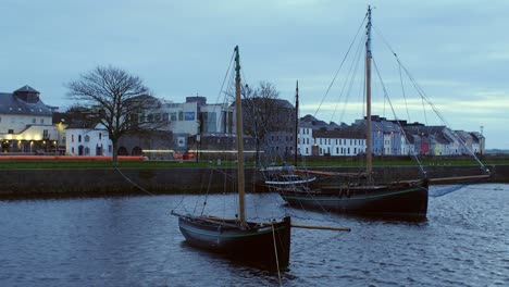 dynamic shot featuring galway hookers moored at claddagh harbour