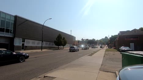 Busy-street-traffic-during-rush-hour-during-the-day-in-Medicine-Hat,-Alberta,-Canada