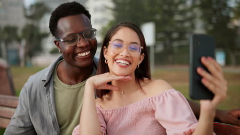 couple taking selfie in park