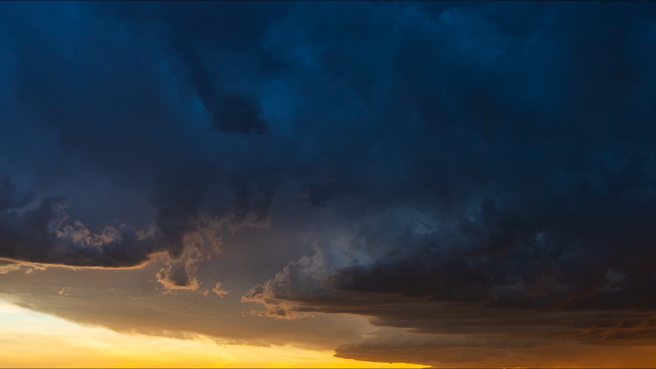 Dramatic Sunset with Dark Clouds