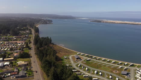 aerial forward over coos bay coast, oregon