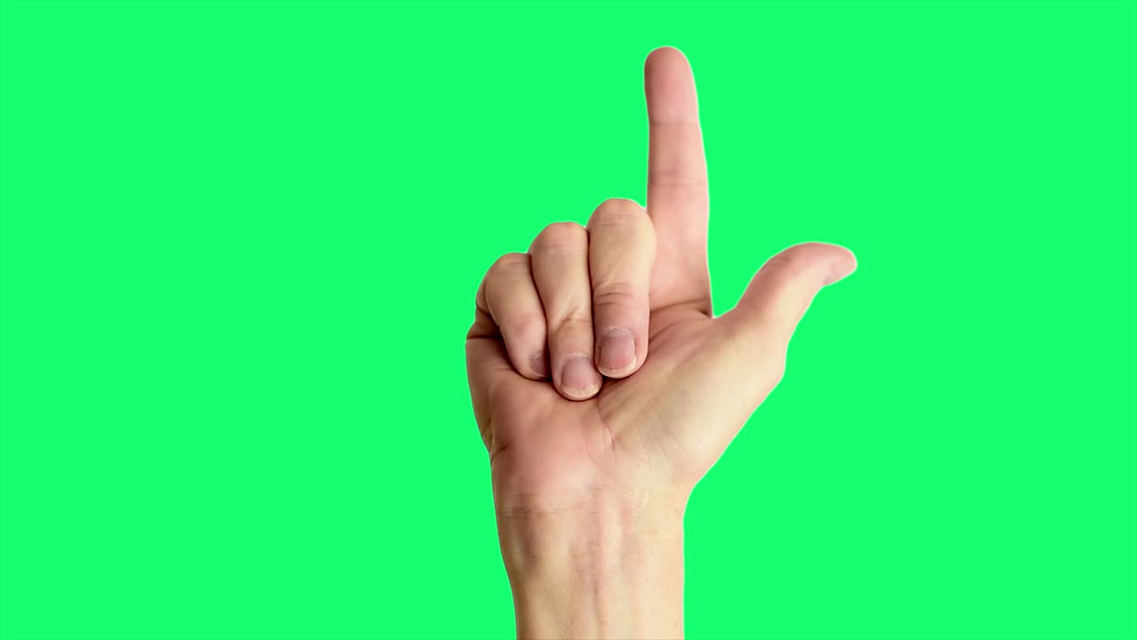 녹색 스크린 배경에 대해 위를 가리키는 남성 손의 근접 촬영 크로마 키링에 이상적입니다.