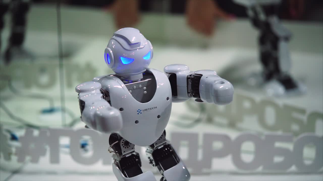 Cute White Robot at an Exhibition