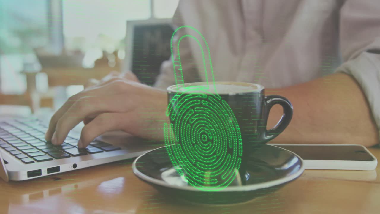 Animation of fingerprint in padlock over midsection of caucasian man with coffee working on laptop