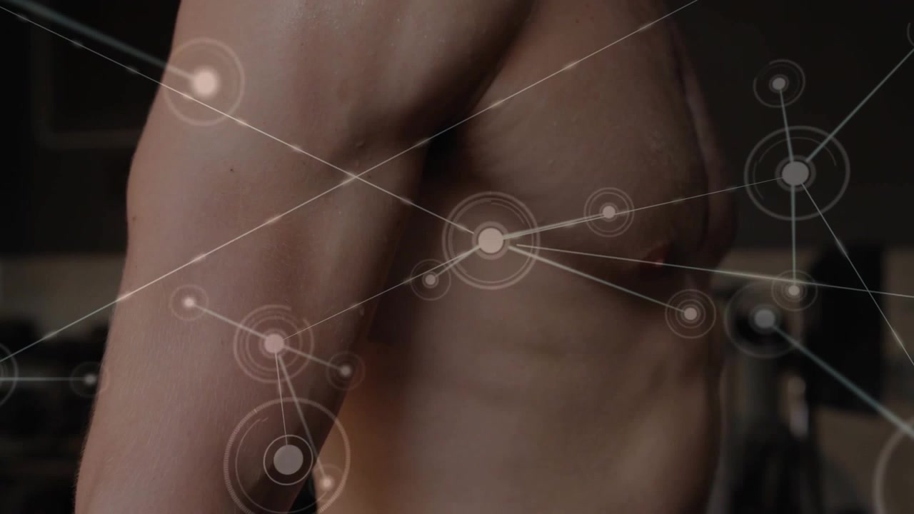 Vertical video: Man curling arm as HUD overlay expanding on chest showing fitness data and dumbbell