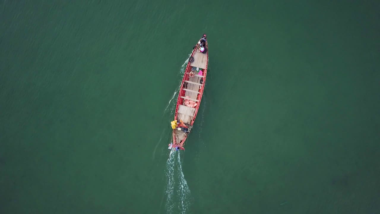 Aerial view of a boat sailing on the sea