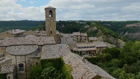 Aerial-over-the-hilltop-village-of-Civita-di-Bagnoregio,-Province-of-Viterbo,-Italy