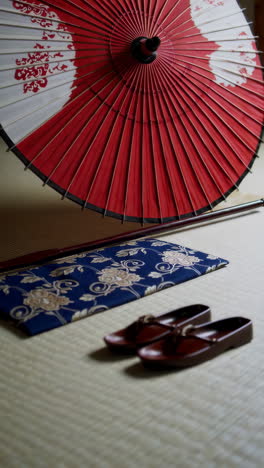 traditional japanese interior with umbrella and geta