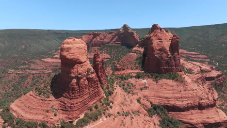 Camera-flies-through-lunar-like-rock-formations-in-Sedona,-AZ