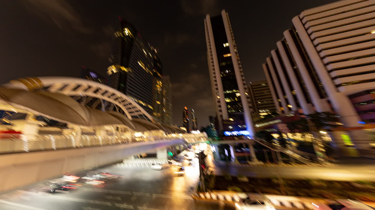 timelapse of rush hour traffic in central bangkok at night